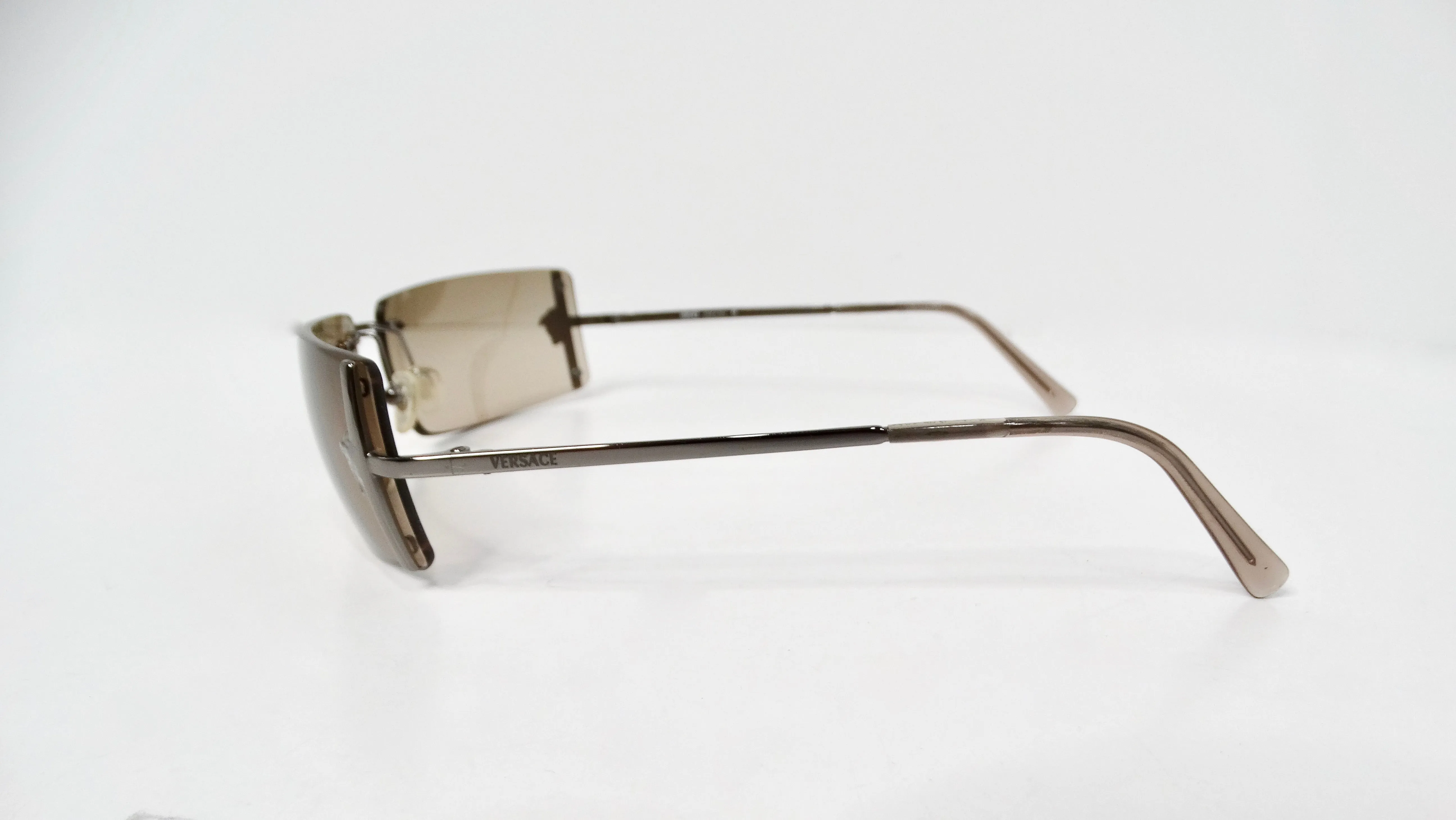 1990s Versace Medusa Brown Tinted Rectangular Rimless Shield Metal Sunglasses