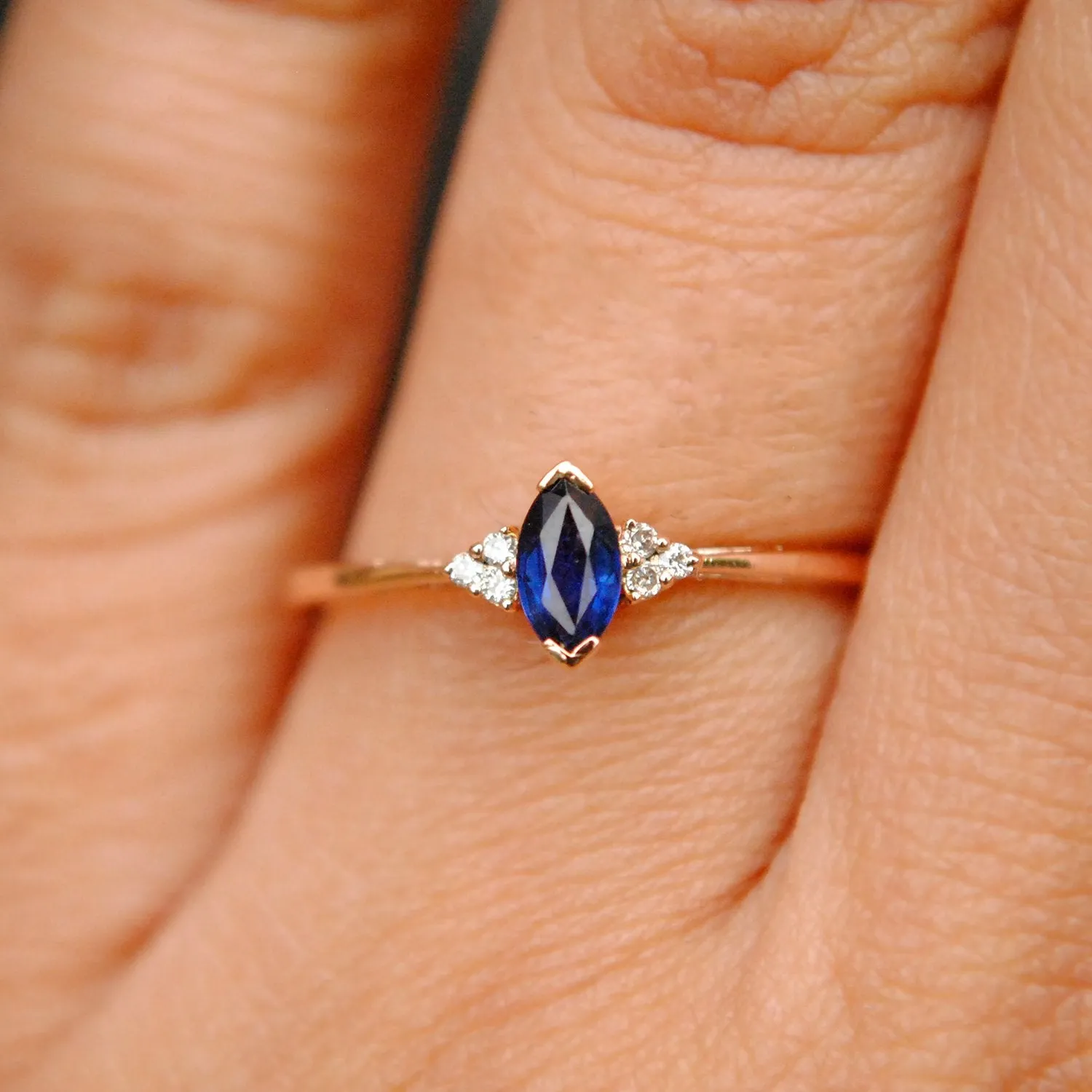 Blue Sapphire Marquise and Diamond Cluster Ring
