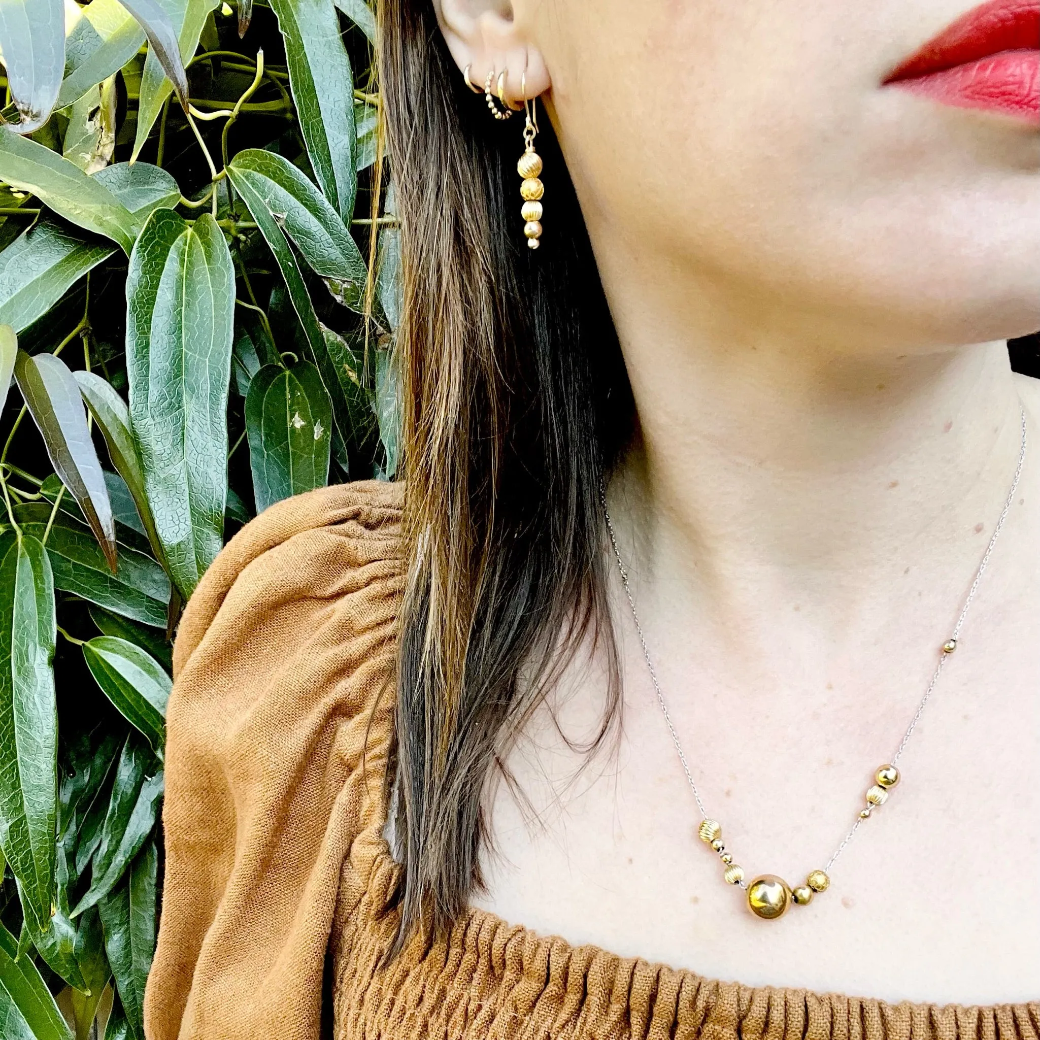 Glowing Gold Bead Bubble Earrings by brunet