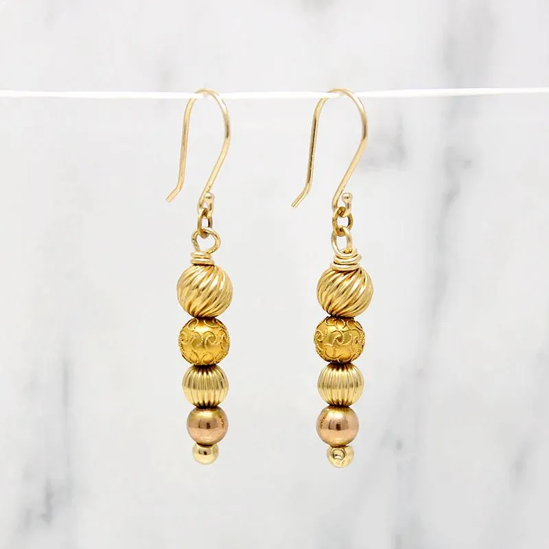 Glowing Gold Bead Bubble Earrings by brunet