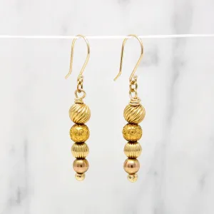 Glowing Gold Bead Bubble Earrings by brunet