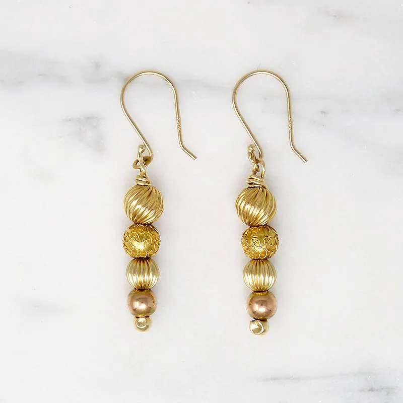 Glowing Gold Bead Bubble Earrings by brunet