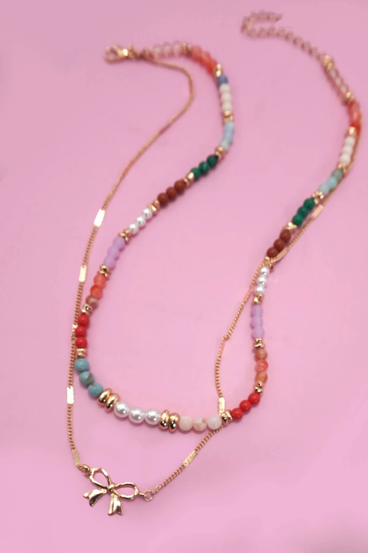 MULTI BEADED BOW CHARM DOUBLE LAYER NECKLACE | 80N91498