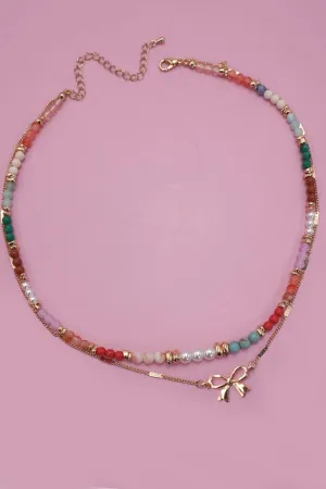 MULTI BEADED BOW CHARM DOUBLE LAYER NECKLACE | 80N91498