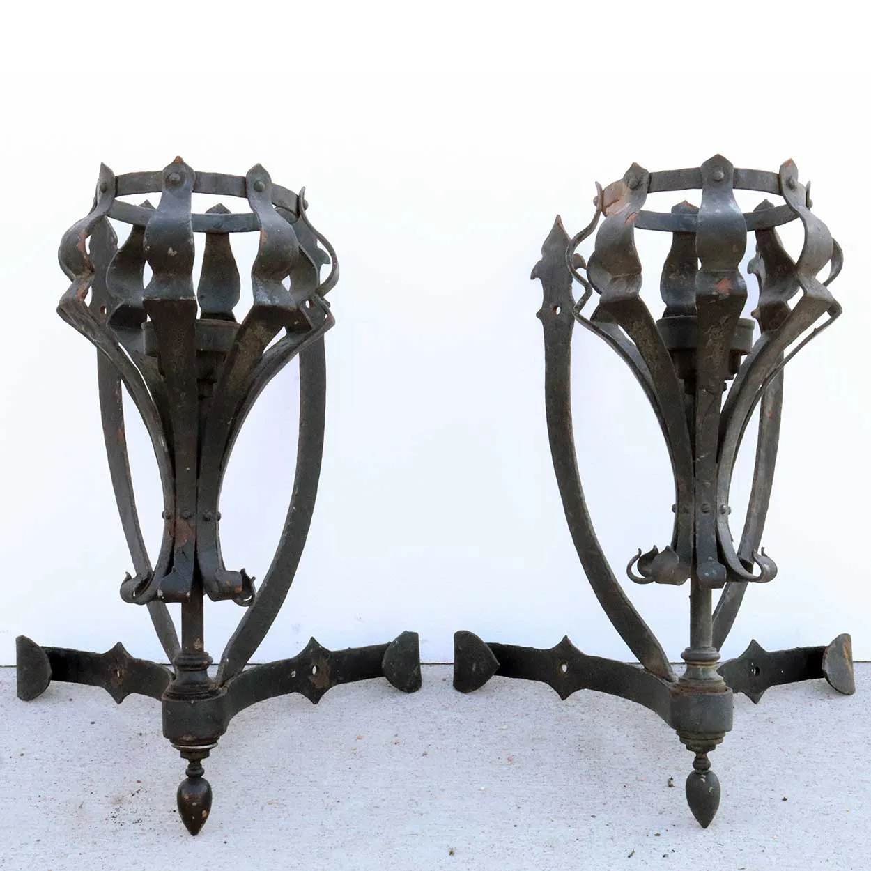 Pair of Large American Medieval Style Painted Wrought Iron One-Light Corner Wall Sconces