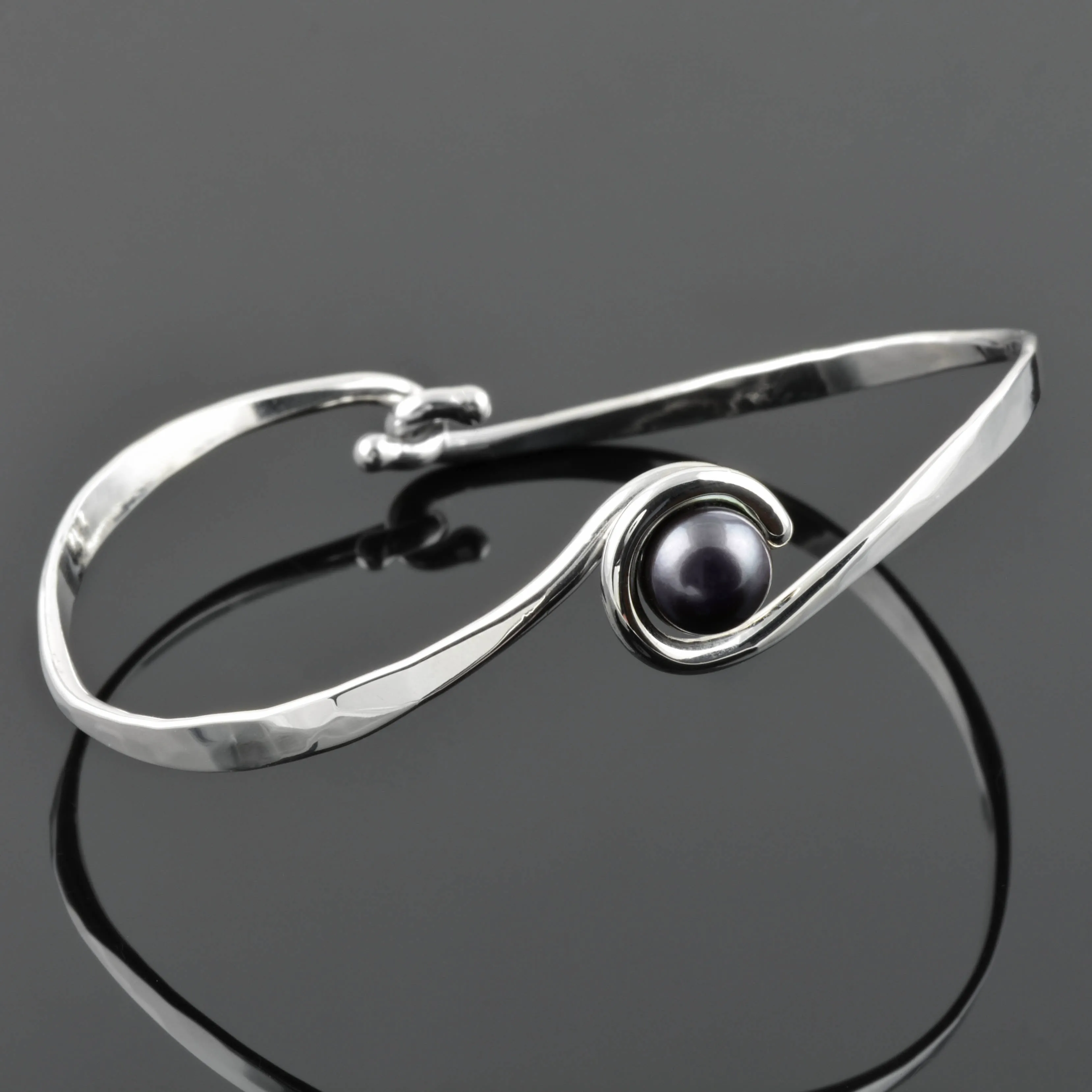 Silver "Curl" Bangle with Black Freshwater Pearl, by Tom Kruskal