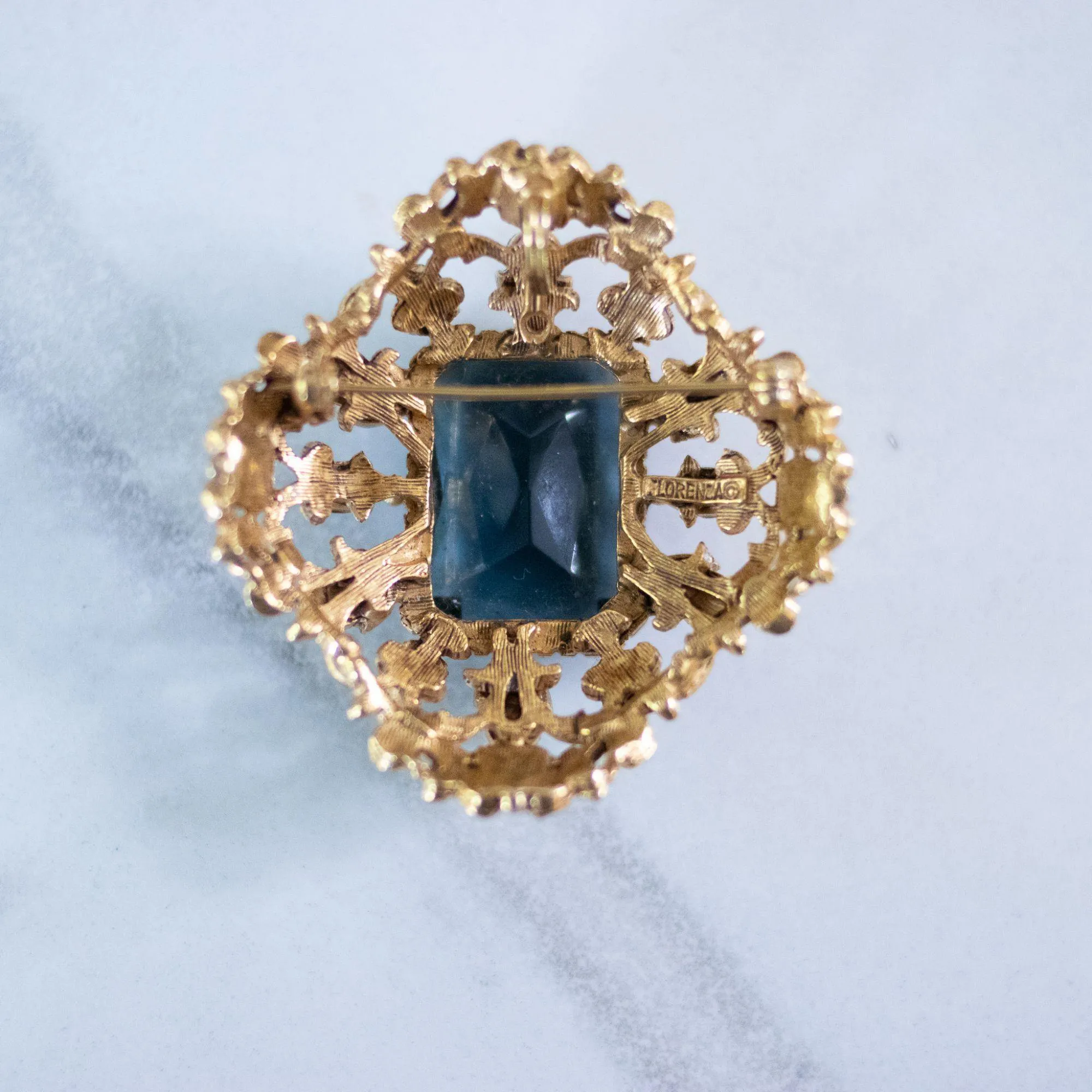 Vintage Florenza Renaissance Revival Ornate Brooch with Blue Crystal, Faux Pearls, and Rhinestones
